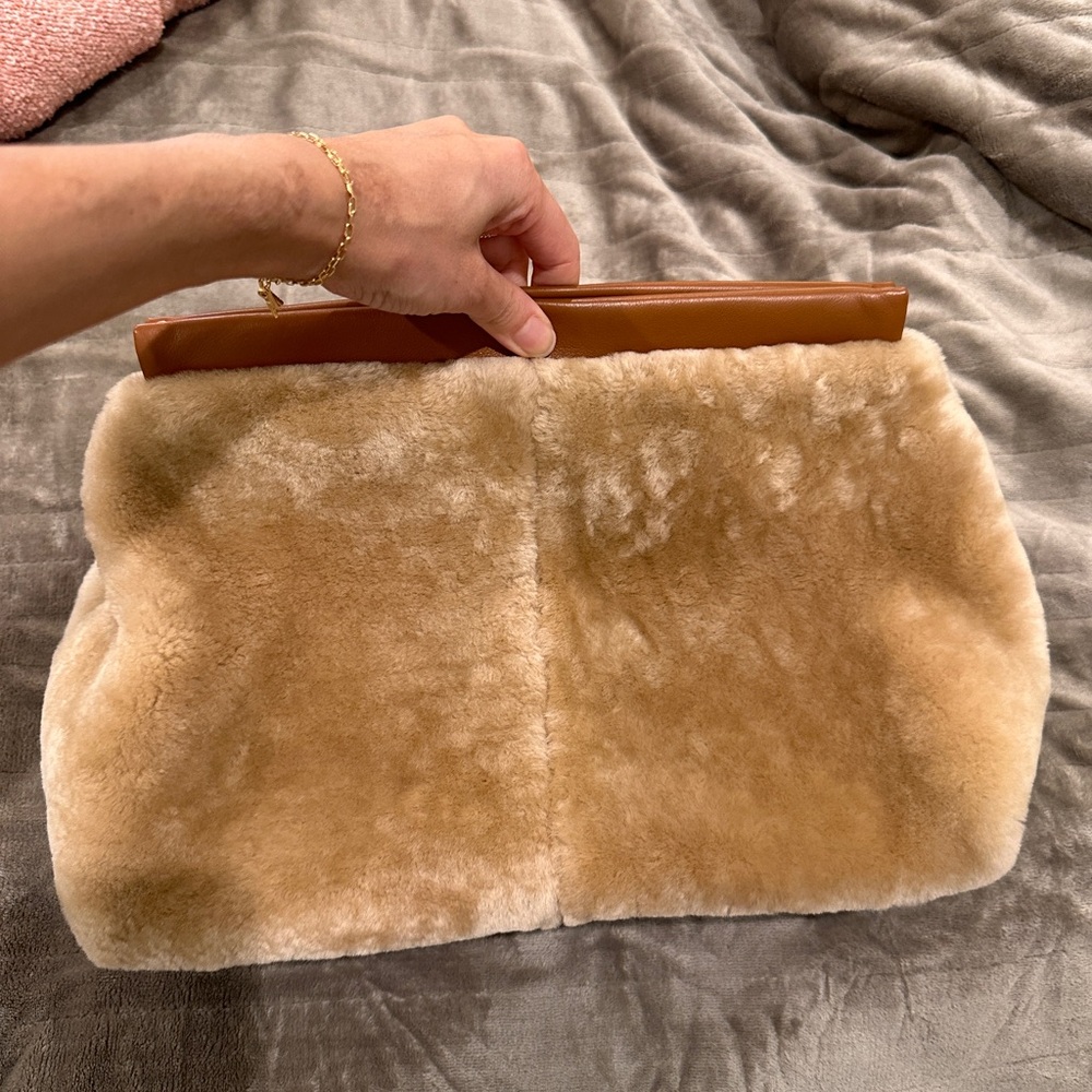 Flattered faux fur clutch